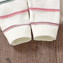 Macacão Manga Longa com Capuz em Tricot