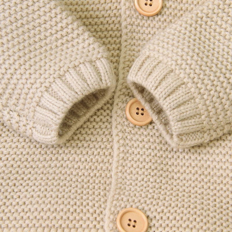 Macacão Manga Longa com Capuz em Tricot