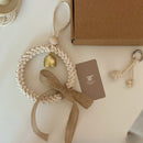 Pingente de Sino de Vento Trançado