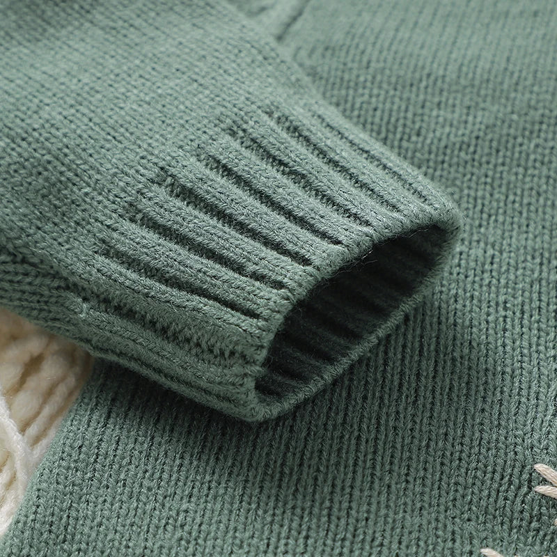 Macacão Manga Longa em Tricot com Bordado