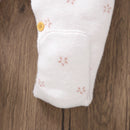 Macacão Manga Longa em Tricot